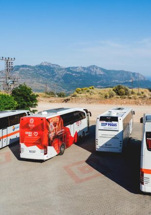 KEMER, TURKEY - May 16, 2018. Touristic buses on parking. Coral travel, Anex tour, Pegas travel agency's transport for tourist excursions.